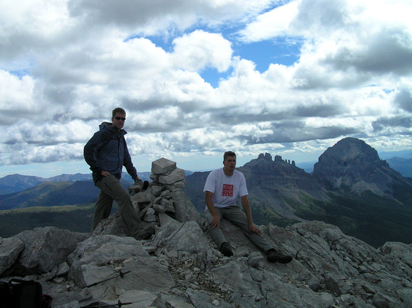 Summit photo. Seven Sisters and Crowsnest Mountain in the background.