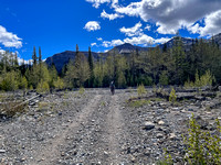 Biking the Clearwater Trail over the Forbidden Creek flats.