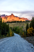 A gorgeous fall day as we approach the Ghost River Wilderness Area - the sunlit peak is Phantom Crag or Devil's Fang.