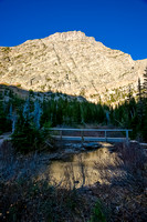 Bertha Peak rises above the foot bridge that takes you both to the camp ground and the start of the scramble route.