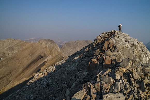 Jon ascends the summit ridge.