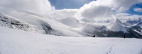 A south-facing panorama from about halfway up the big snow slope. You can see the upper bowl on the left and Wilcox Pass and Nigel Meadows in the distance at center.