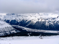 The northern end of the Columbia Icefield is hidden in clouds at left.