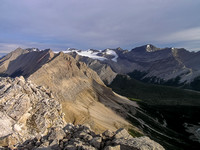 Mount Drummond on the right with Pipestone and Cyclone on the left. Peaks on the Drummond Icefield in the distance are mostly unnamed.