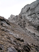 Looking up at the crux from the scree gully.