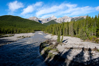 The Little Elbow River looks high as I cross it. My peaks to the right at distance.