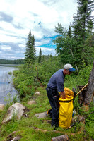 Bill readies his pack at the Leano Lake put-in at the end of a 350m portage from the parking lot.