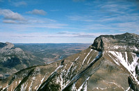 Looking past the north buttress of McGillivray to Yamnuska (L).