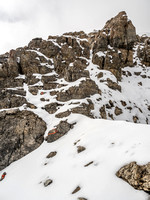 The final defense of the summit is the strongest one but there is a clearly marked route that picks its way through the towers with only moderate scrambling required.