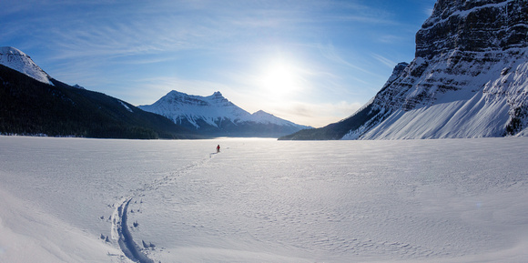 Skiing across Hector Lake.