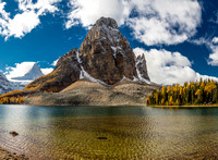 A great view of Mount Assiniboine and Sunburst Peak from the shoreline of Cerulean Lake.