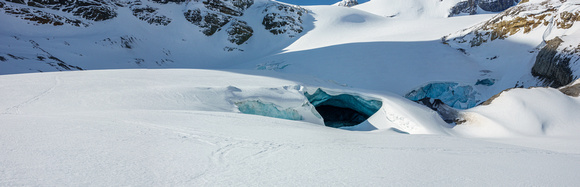Skiing past the recently broken up toe of the Peyto Glacier.