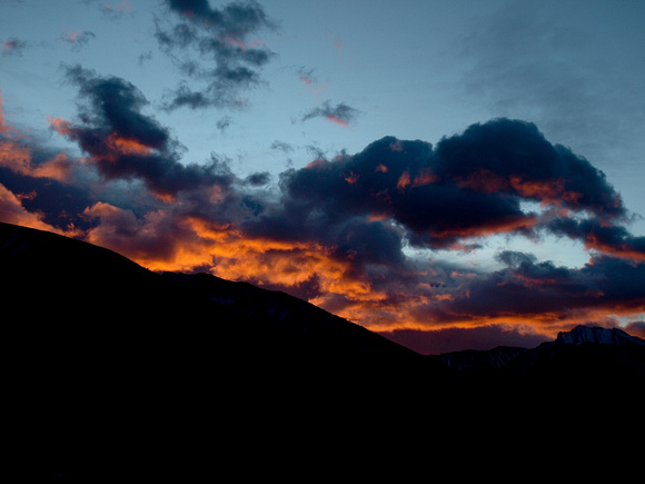 A fiery sunrise along hwy 40. Fisher Peak is just visible on the right hand side of the photo.