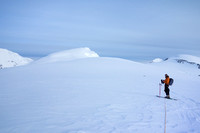 Skiing from camp at first light. North Twin at left and Stutfield at right.