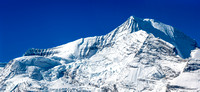 Mighty Mount Robson with the Helmet in front of its east face and the Kain Face rising above The Dome on the left.