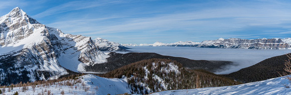 An inversion cloud layer over the Bow Valley. Storm at left, Castle at right distance.