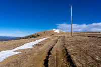 Hiking along the summit ridge road in glorious early Spring conditions.