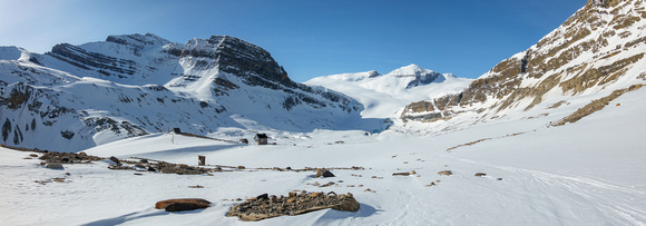 Skiing along the moraines past the old research station towards a distant Peyto Glacier.