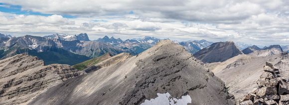 Looking north, back over the false summit with McPhail rising impressively at distant right. Abruzzi rising at left and Joffre at center distance.