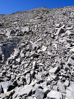 This is the rubble-fest on McPhail's south face. You can't avoid it so best deal with it!