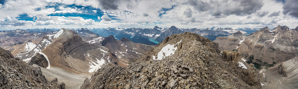 Spreading Peak at left and Bison at right with Mount Chephren rising over the false summit in the distance at center.
