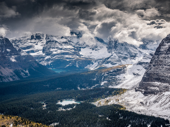 Looking over Linda Lake towards Lake O'Hara with Hungabee and other giant peaks rising into the clouds beyond.