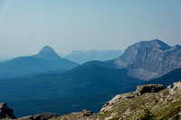 Views south to Crowsnest Mountain (L).