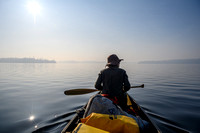 Paddling a calm Otter Lake along the Churchill River.