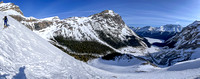 Skiing up the canyon by-pass moraine. Caldron and Peyto Lake at right.