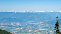 Zooming in on the mountain ranges to the north, across the Fraser Valley.