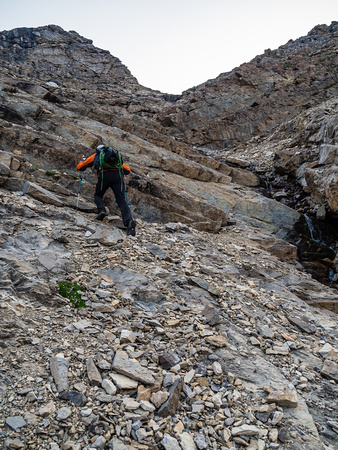 We managed to find some quick and relatively solid slabs lower down before the scree became interminable.