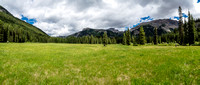 Looking back at Eric (R) from the expansive and beautiful Police Meadows. Citadel Pass at center distance with Golden Mountain above at right.