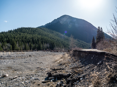 Mount Mann looms over the apocalypse that is the remains of the entrance road to the Sentinel Provincial Recreation Area - destroyed in the 2013 floods.