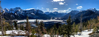 Looking over Lac des Arcs and up the Bow Valley towards Canmore with the Sisters, Grotto Mountain, Gap Mountain and Anklebiter Ridge at center and right.