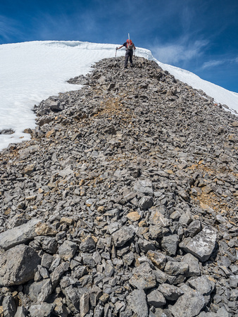 The massive summit cornice wasn't an issue for mighty Mike.