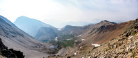 Nearing the col, looking back at Mount Bourgeau (L) with Harvey Pass left of center and the three Harvey Lakes barely visible in the smoke.