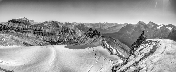 Phil enjoys great views over the Drummond Icefield towards Mount Drummond at left and the Pipestone Towers at center.