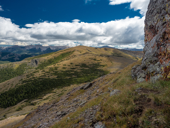 Looking back at McGillivray Ridge from under the summit block of Ma Butte.
