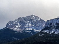 Telephoto of the north side of Yamnuska, note all the scramble trails up to the summit from the left.
