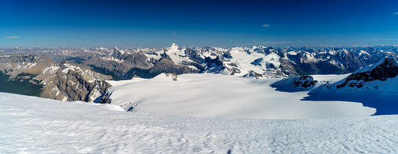The entire main Lyell Icefield stretches out towards the Forbes and Mons Glaciers and summits. Arctomys at mid left