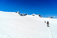 Rounding the south ridge of Christian now and descending to the main Lyell Icefield. The five Lyells all visible now.