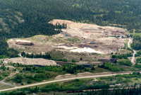 Telephoto of the busy concrete plant operations that keep the housing market in Calgary going.