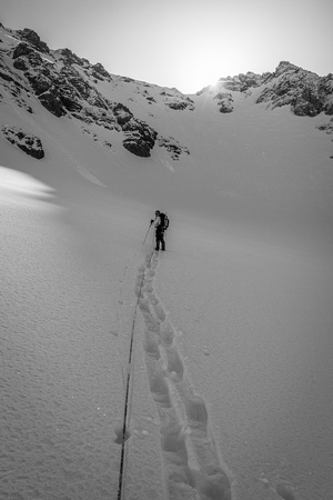 Roped up on the AA Glacier with the AA Col directly ahead and above Ferenc.