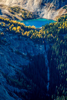 A gorgeous tarn near White Man Mountain that drains to an impressive waterfall.