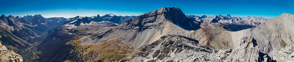 Pano from the false summit showing the Royal Group in the distance at left, Sharkfin, Solderholm, White Man, Alcantara, Aye, Assiniboine and Vavasour