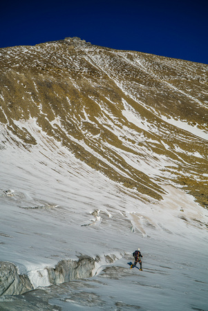 The endless scree slope above the glacier was as much fun as it looks. NONE.