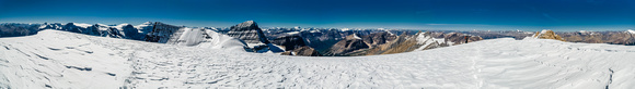 A panorama from what the majority of climbers consider the summit of Diadem Peak. The slightly higher - and much more difficult - rocky summit at right.