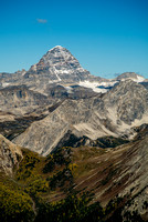 The mighty Mount Assiniboine looms over Mount Gloria.