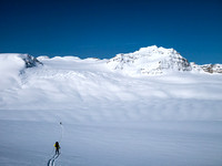 Skiing down onto the western edge of the Wapta towards Mount Collie.