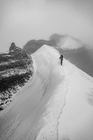 Steven traverses a snow arete on the ridge - we were grateful for crampons and axes at this point!